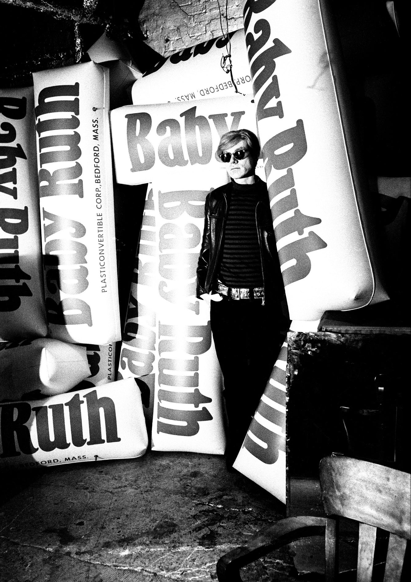 Andy Warhol with Inflatable Baby Ruth Bars \ Silver Factory, 1966