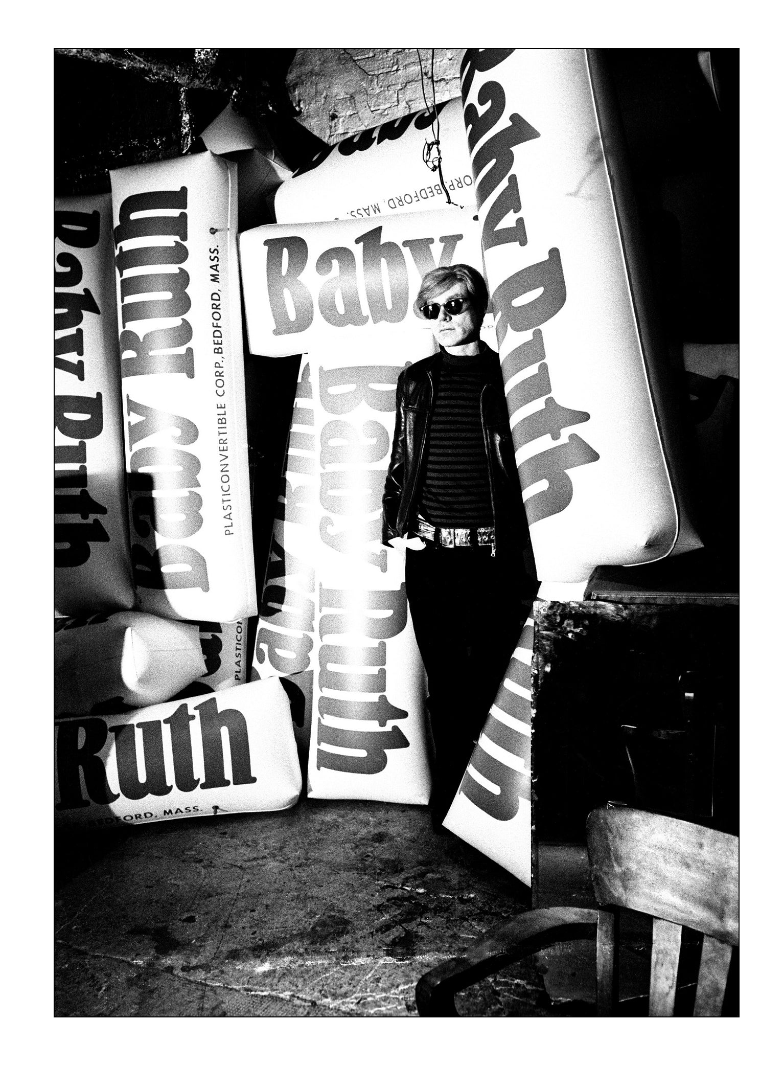 Andy Warhol with Inflatable Baby Ruth Bars \ Silver Factory, 1966